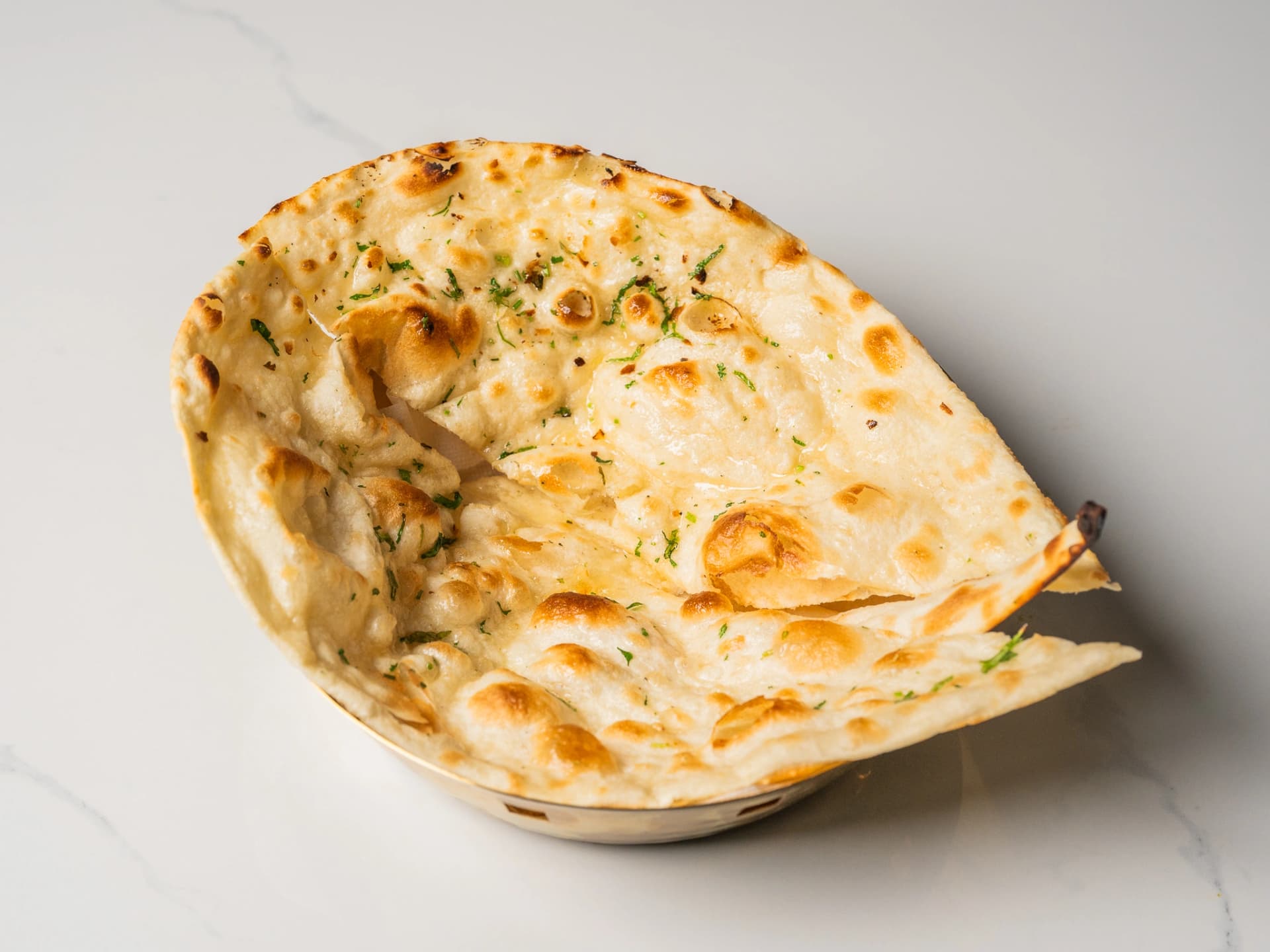 Butter Naan at Chopras Indian Restaurant Den Haag